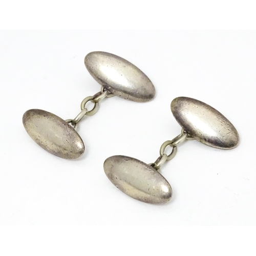 701 - A pair of silver cufflinks hallmarked Chester 1895 maker Charles Horner.