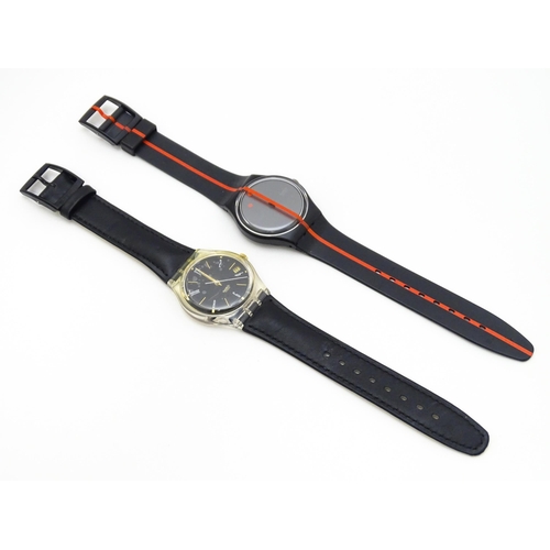 754 - Two Swatch watches with quartz movements, one a numbered edition designed by Felice Varini (2)