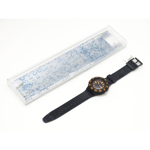 755 - A Swatch Barrier Reef Scuba 200 wristwatch. Watch case approx. 1 1/2