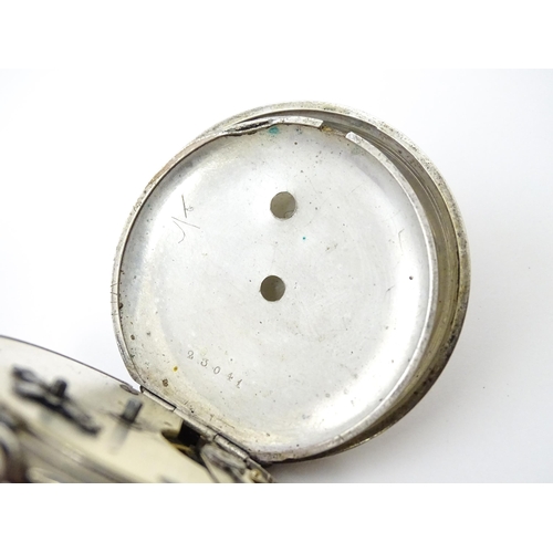 761 - A silver cased pocket watch with white enamel dial, Roman numerals and subsidiary seconds dial.  app... 