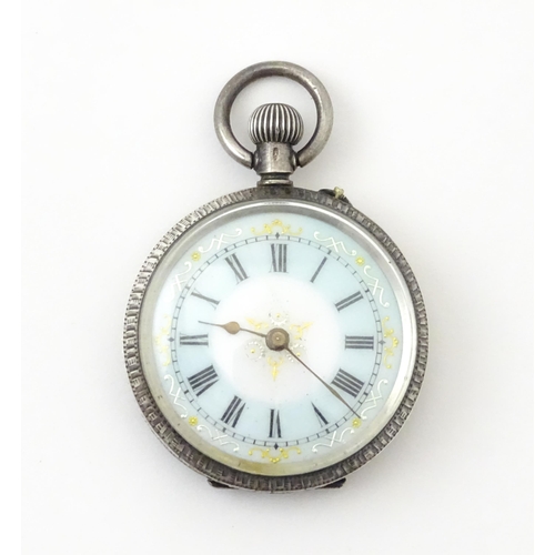 762 - A Swiss silver cased pocket / fob watch with enamel detail and Roman Numerals. Approx 1 /4