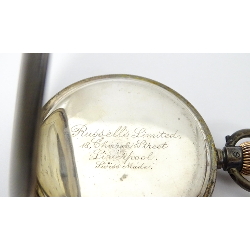 764 - A Swiss silver hunter pocket watch with white enamel dial and subsidiary seconds dial. Engraved Russ... 