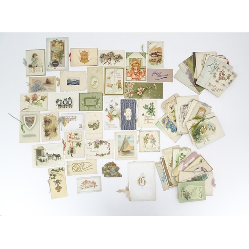 968 - A quantity of early 20thC greetings cards, Christmas cards, Birthday wishes, postcards, etc. Subject... 