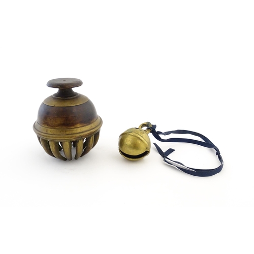 1038 - An Indian brass elephant claw bell. Together with a crotal bell marked AD and HN. Claw bell approx. ... 