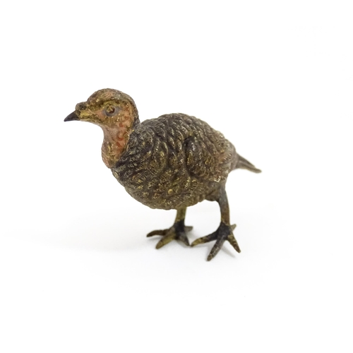 1052 - A cold painted bronze model of a game bird. Approx. 1 3/4