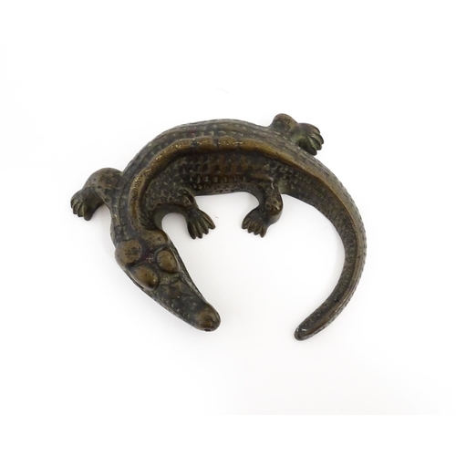 1054 - A 20thC cast bronze model of a crocodile / alligator. Approx. 5 1/4