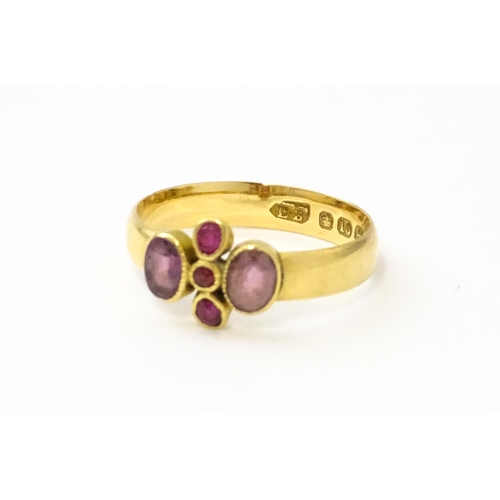 533 - A Victorian 18ct gold ring set with three rubies flanked by two amethysts, hallmarked Birmingham 189... 