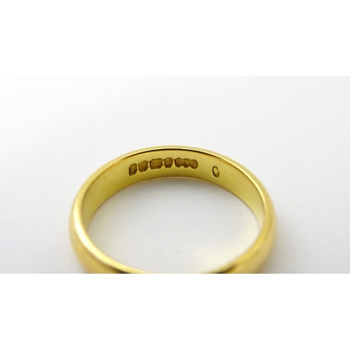 538 - A 22ct gold wedding band Ring size approx. I 1/2 (approx. 4g)