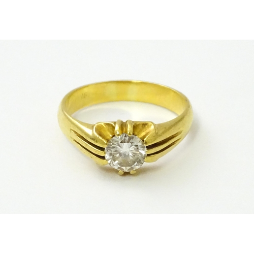 545 - A gold ring set with central diamond Ring size approx. S/ ( diamond approx 4mm) (total weight approx... 