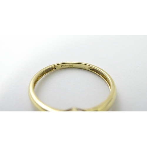 563 - Three 14ct gold rings set with white stones to be worn together. Ring size approx. R 1/2 (3)