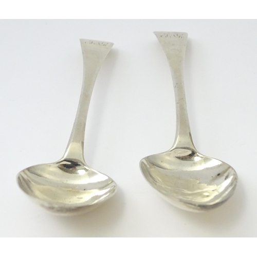 230 - A pair of George III silver tablespoons. London 1809 maker IB. Approx. 9