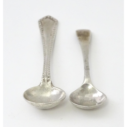 252 - A matched pair of silver mustard pots, one hallmarked London 1930, maker Goldsmiths & Silversmiths C... 