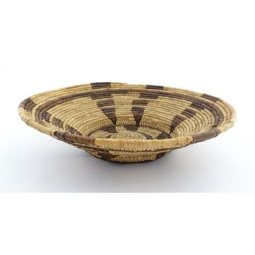 1102 - Ethnographic / Native / Tribal: A woven basket bowl with geometric banded detail, possibly Native Am... 