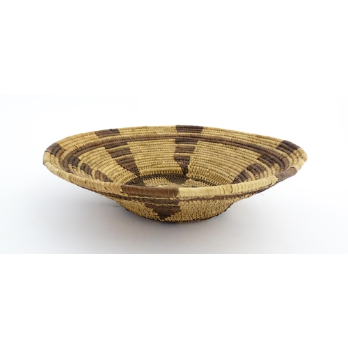 1102 - Ethnographic / Native / Tribal: A woven basket bowl with geometric banded detail, possibly Native Am... 