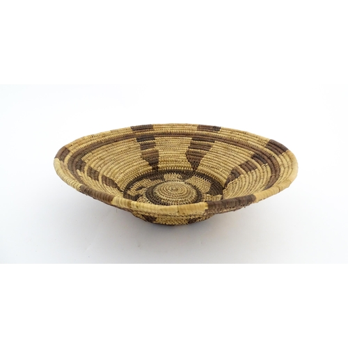 1102 - Ethnographic / Native / Tribal: A woven basket bowl with geometric banded detail, possibly Native Am... 