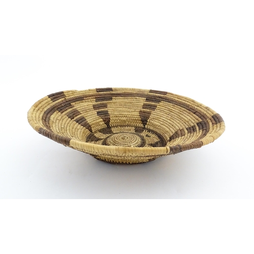 1102 - Ethnographic / Native / Tribal: A woven basket bowl with geometric banded detail, possibly Native Am... 