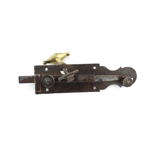 1220 - Two 18thC steel door latches with shaped back plates. Largest approx. 10