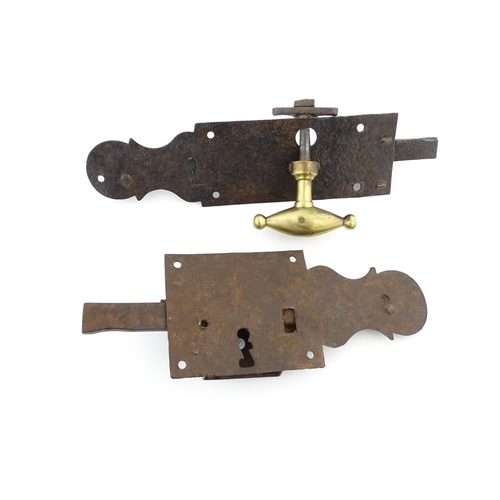 1220 - Two 18thC steel door latches with shaped back plates. Largest approx. 10