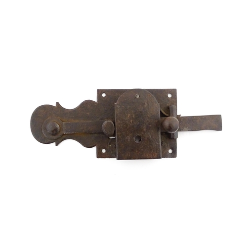 1220 - Two 18thC steel door latches with shaped back plates. Largest approx. 10