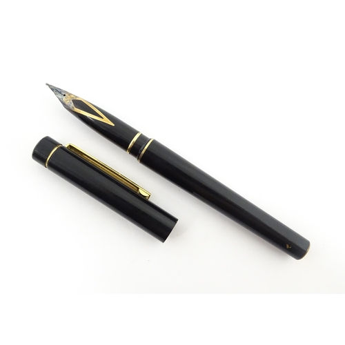 1273 - A Schaeffer 'Targa' fountain pen, with black barrel and cap, 14k gold nib, approx 5 3/8