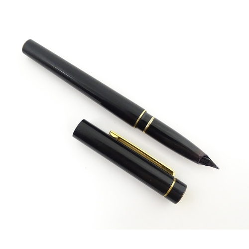 1273 - A Schaeffer 'Targa' fountain pen, with black barrel and cap, 14k gold nib, approx 5 3/8