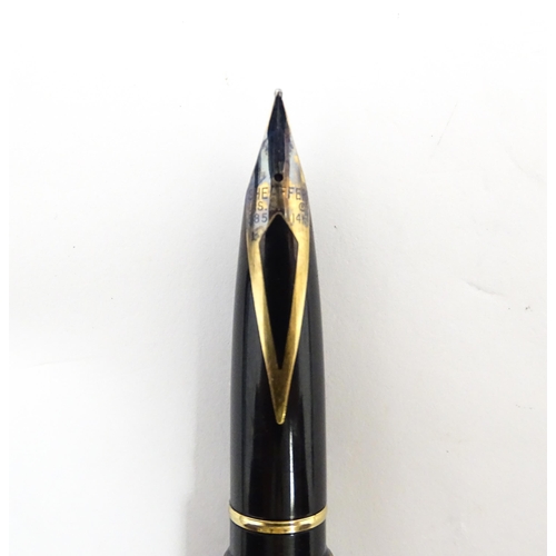 1273 - A Schaeffer 'Targa' fountain pen, with black barrel and cap, 14k gold nib, approx 5 3/8