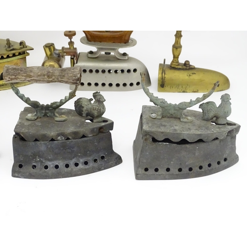 1306 - A quantity of assorted 19thC and later cast brass and iron flat irons, to include Feldmeyer spirit i... 