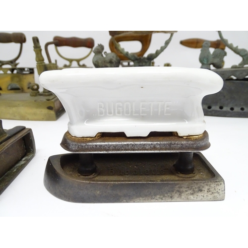 1306 - A quantity of assorted 19thC and later cast brass and iron flat irons, to include Feldmeyer spirit i... 