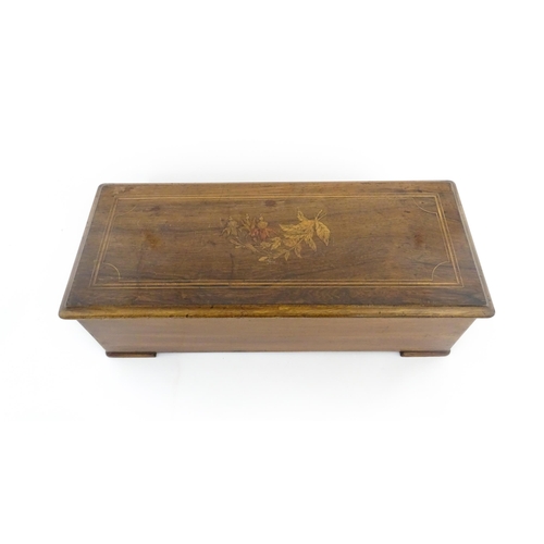 1309 - A 19thC Swiss rosewood music box with marquetry inlaid decoration to lid, playing 10 airs, by PVF of... 