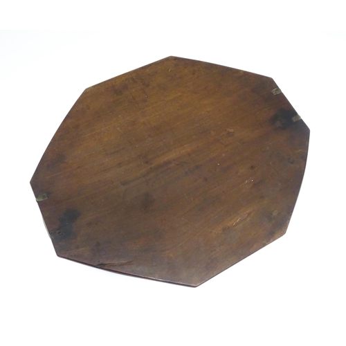 1352 - A late 19th / early 20thC mahogany tray of octagonal form with twin handles. Approx. 21 1/4