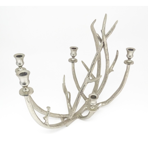 1353 - A 20thC cast candelabra / candle stand of antler form with five sconces. Approx. 18