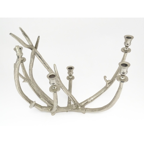 1353 - A 20thC cast candelabra / candle stand of antler form with five sconces. Approx. 18