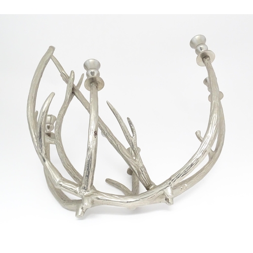 1353 - A 20thC cast candelabra / candle stand of antler form with five sconces. Approx. 18