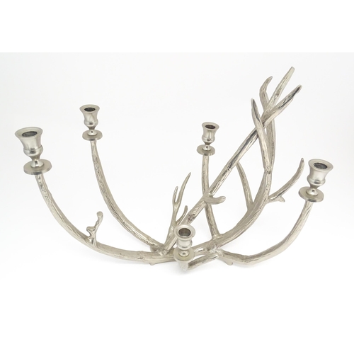 1353 - A 20thC cast candelabra / candle stand of antler form with five sconces. Approx. 18