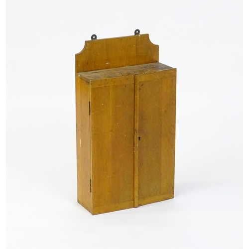 1355 - An early / mid 20thC wall hanging work box , containing carpentry / woodworking tools to include spo... 