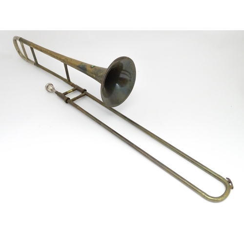 1369 - Musical Instrument : a mid 20thC 'Starline' Trombone by Rudall Carte & Co Ltd, London. Approx 46 1/2... 