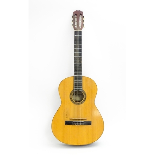 1371 - Musical instrument : a mid 20thC M. G. Contreras of Madrid classical guitar. Approx 39