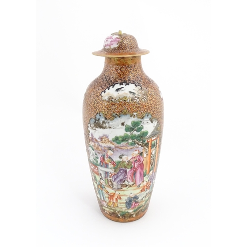 12 - A Chinese famille rose vase and cover decorated in the Mandarin pattern, with vignettes depicting fi... 