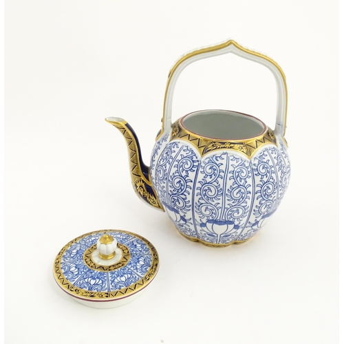 126 - A Victorian Worcester Aesthetic Movement blue and white teapot with fixed handle decorated in the Li... 