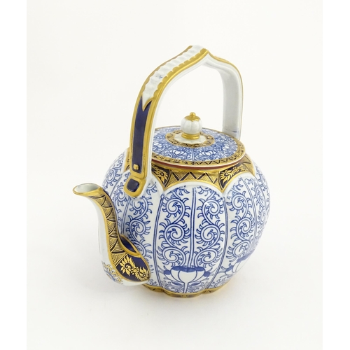 126 - A Victorian Worcester Aesthetic Movement blue and white teapot with fixed handle decorated in the Li... 