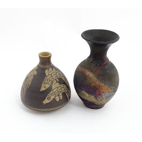 153 - Two items of studio pottery to include a Raku vase with a flared rim by Pat Armstrong, and a squat v... 