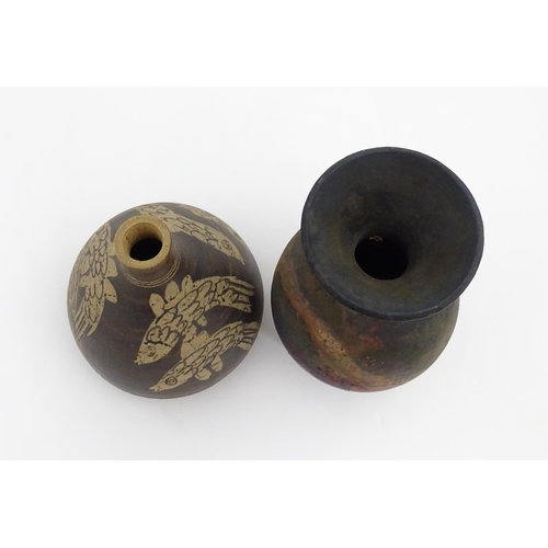 153 - Two items of studio pottery to include a Raku vase with a flared rim by Pat Armstrong, and a squat v... 