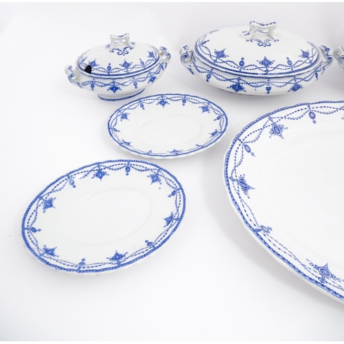 155 - A quantity of Keeling & Co. blue and white Losol Ware dinner wares in the Ludgate pattern to include... 