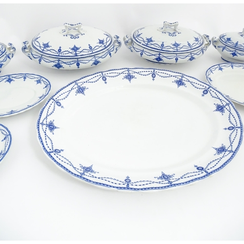 155 - A quantity of Keeling & Co. blue and white Losol Ware dinner wares in the Ludgate pattern to include... 