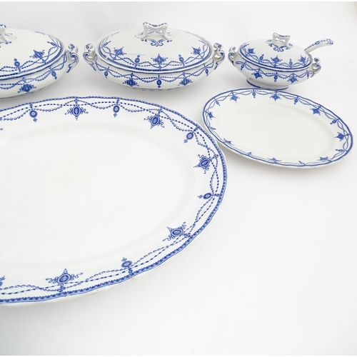 155 - A quantity of Keeling & Co. blue and white Losol Ware dinner wares in the Ludgate pattern to include... 