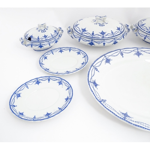 155 - A quantity of Keeling & Co. blue and white Losol Ware dinner wares in the Ludgate pattern to include... 