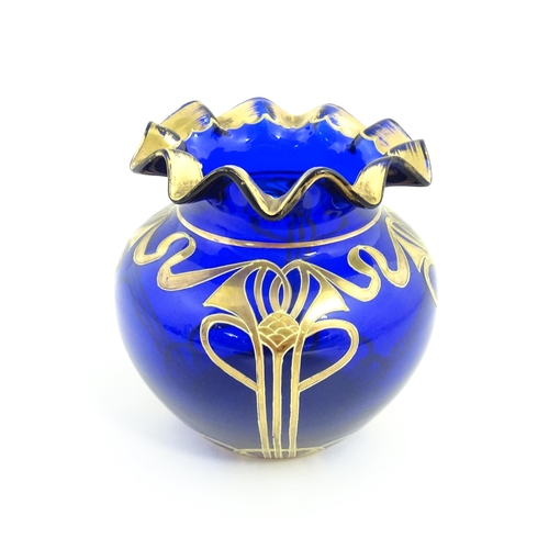 160 - An Art Nouveau blue glass vase with gilded detail, possibly by Moser. Approx. 5 1/4