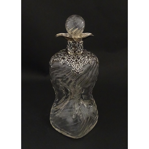 162 - A Victorian glass glug glug / pinch decanter with a pierced silver mount hallmarked London 1898, mak... 