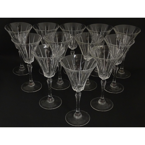 178 - A set of twelve glass wine glasses, in the Novecento pattern by Royal Crystal Rock. Approx. 7 1/2