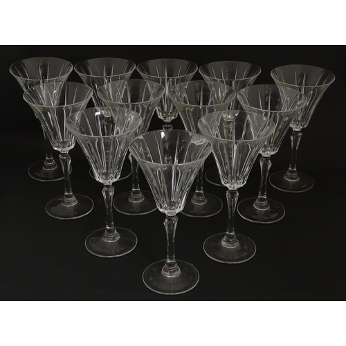 178 - A set of twelve glass wine glasses, in the Novecento pattern by Royal Crystal Rock. Approx. 7 1/2